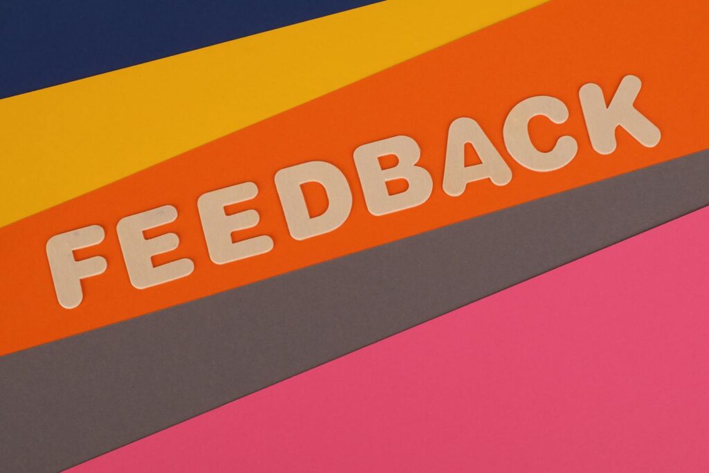Colorful Wallpaper with Feedback Sign